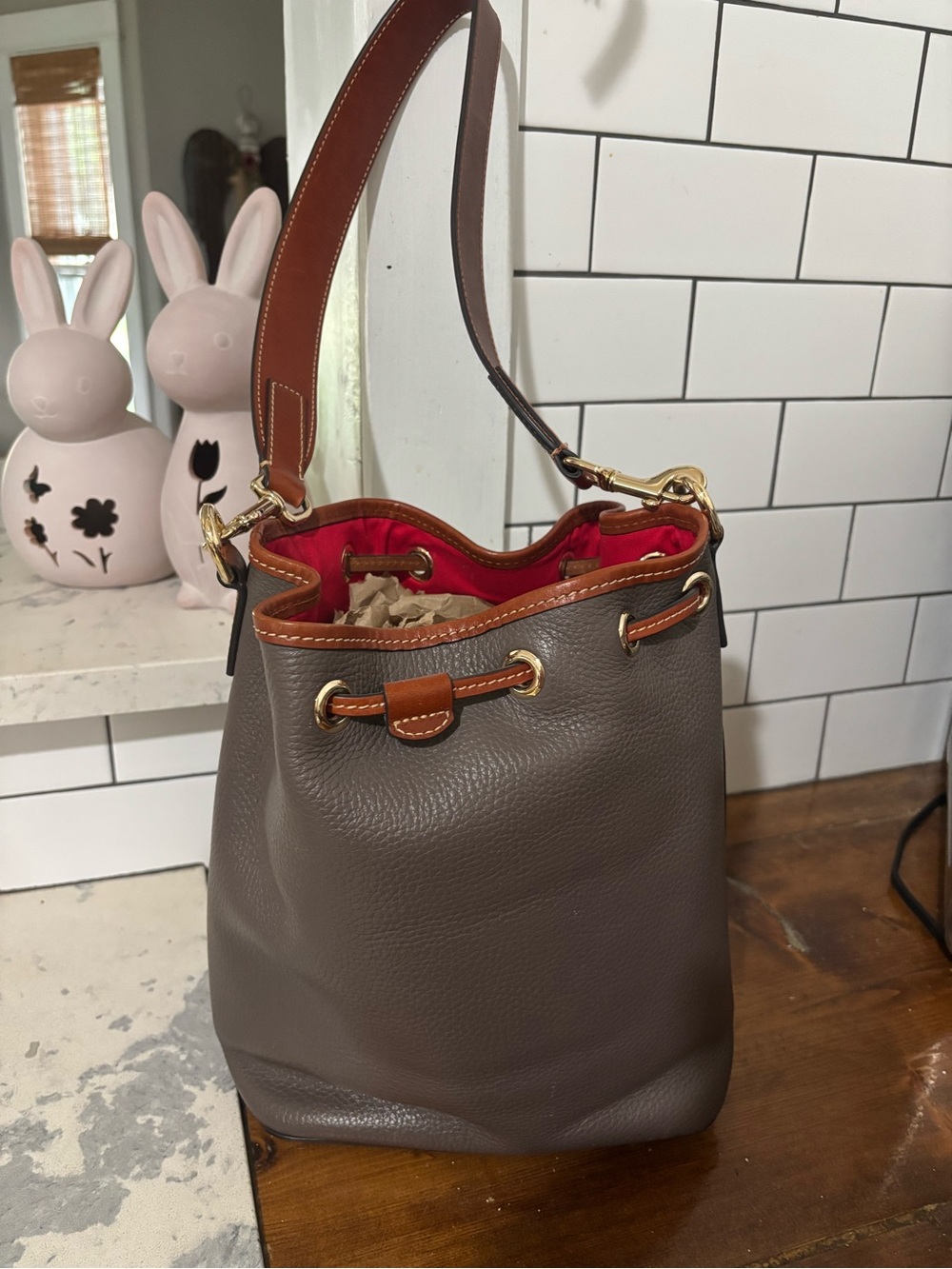 Dooney & Bourke Gray Pebbled Leather Drawstring Bucket Bag with Brown Trim - Picture 2 of 6